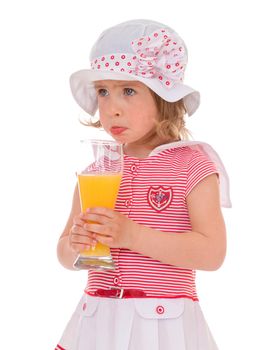 charming little girl with a glass of juice.