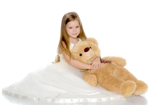 Little girl with teddy bear