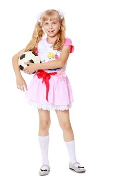 Girl playing with soccer ball