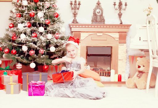 Little Princess around the Christmas tree.