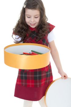 Young girl with big round box.