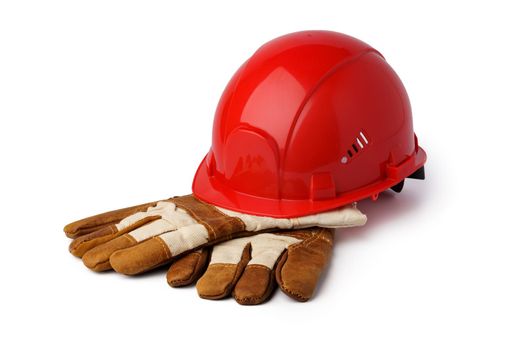 Safety hardhat and work gloves isolated on white background