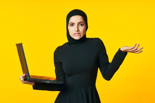 Muslim laptop in hands learning student emotions ethnicity model