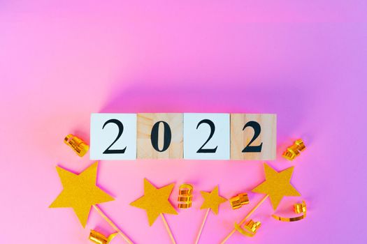 New Year 2022 concept on pink background