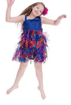 girl jumping spinning and waving hands