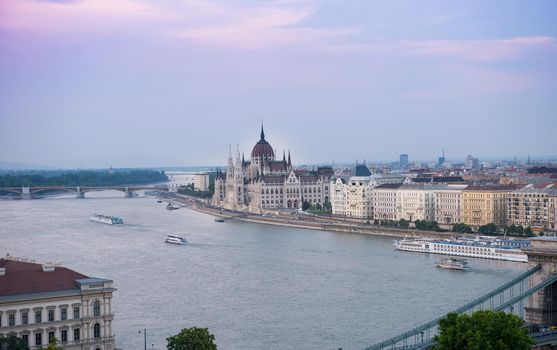 beautiful purple sunset on Danube and Hungarian Parliament