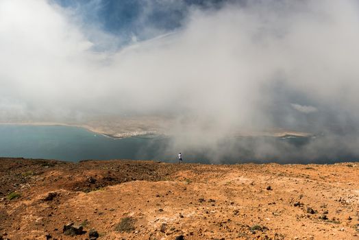 misty view on neighboring isle coastline from Lanzarote