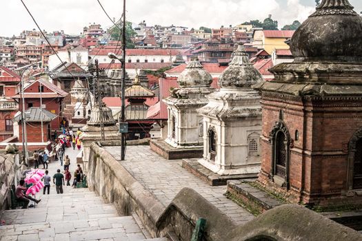 Wall with white small temples around Pashupatinath temple. Kathmandu, Nepal, Asia.