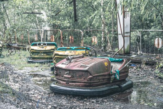 obsolete rusty cars in Pripyat park