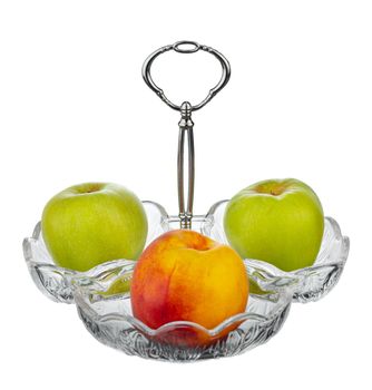Glass bowl for fruits storage isolated on white