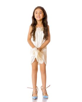 A small Asian girl in high-heeled shoes.