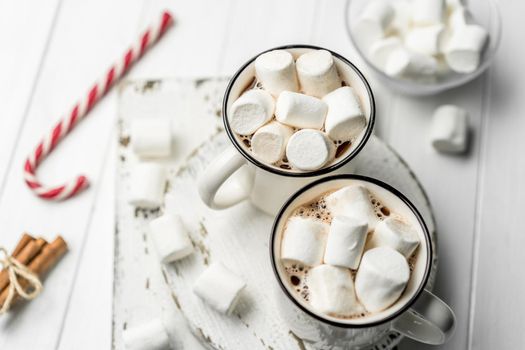 Marshmallow in cups with delicious cocoa