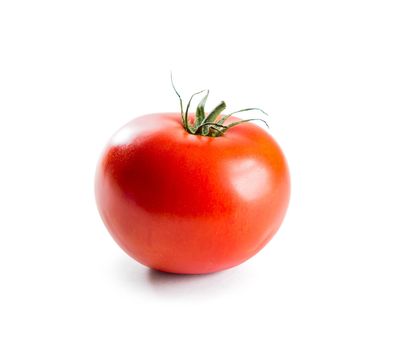 Fresh red tomato with green stem