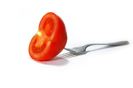 Fork and tomato