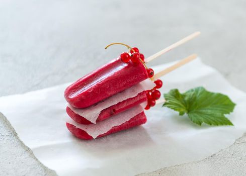 red currant ice-cream on top of each other