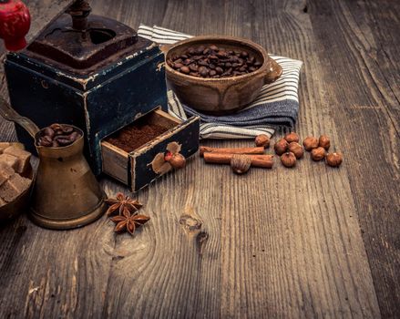 old grinder and coffee beans