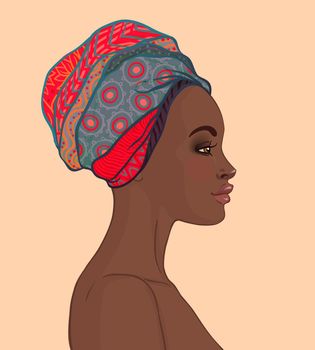 Portrait of beautiful African woman in turban (profile view)
