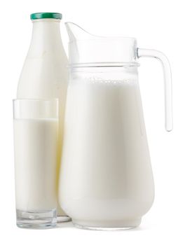Glassware full of fresh milk isolated on white
