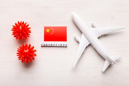 Flight ban and closed borders for tourists and travelers with coronavirus covid-19. Airplane and flag of China on a white background. Coronavirus pandemic.