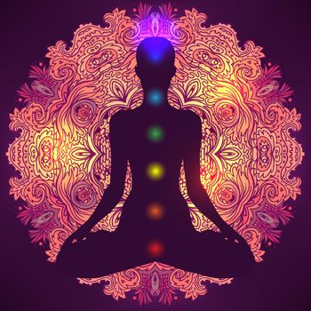 Woman ornate silhouette sitting in lotus pose. Meditation, aura and chakras