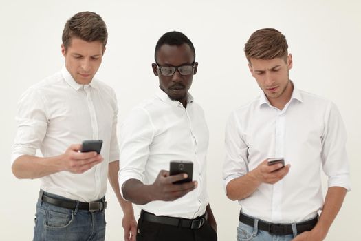 Group young multiethnic business people using mobile phones