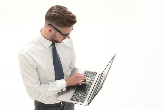 responsible businessman using laptop .
