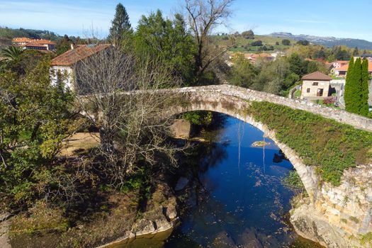 Aerial view of a scenic medieval bridge in Lierganes, Cantabria, Spain.