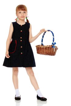 Little girl with a wicker basket