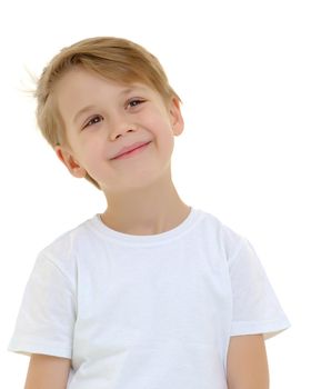 Emotional little boy in a pure white t-shirt.