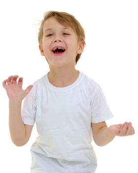 A little boy in a pure white t-shirt laughs. Emotions.