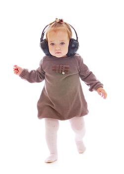 A little girl with headphones