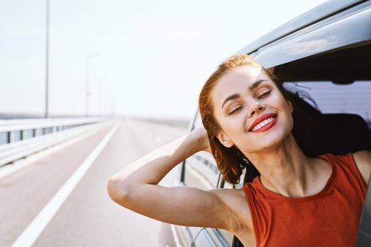 cheerful woman car ride road travel adventure