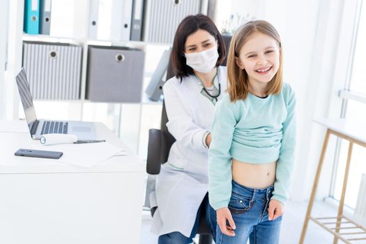 Girl during appointment with doctor