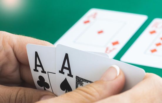 Aces in hands of gambler