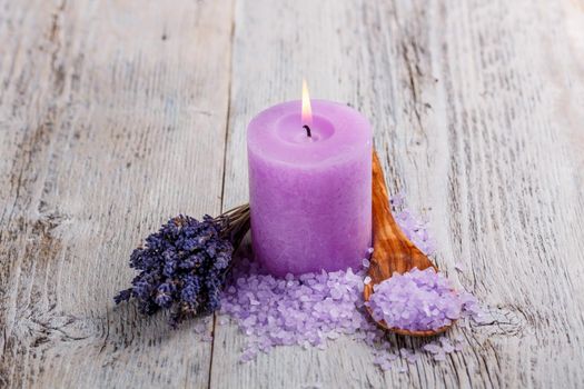 Candle with lavender flowers. Aromatherapy concept 