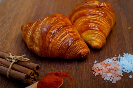 french traditiona croissant brioche butter bread  on wood