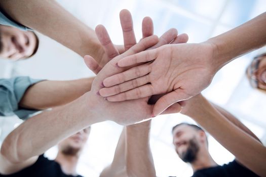 Multiracial Group of Friends with Hands in Stack