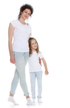 Mom and daughter in jeans white shirts