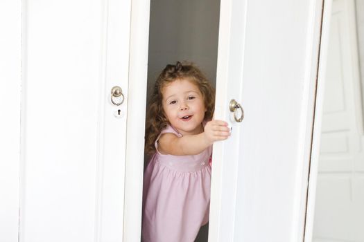 Cute girl in closet