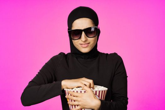 Muslim woman entertainment cinema popcorn fashion model ethnicity
