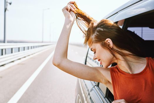 cheerful woman car ride road travel adventure