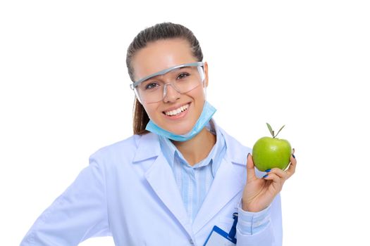 Dentist medical doctor woman hold green fresh apple in hand and tooth brush. Dentist doctors. Woman doctors