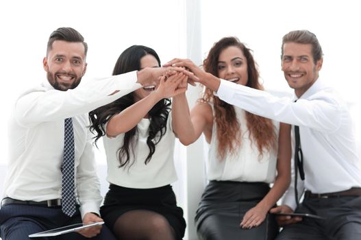 successful business team with hands clasped together