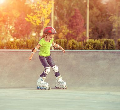 Little girl on roller skates