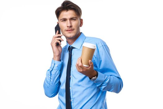 businessmen communication on the phone a cup of coffee studio lifestyle. High quality photo