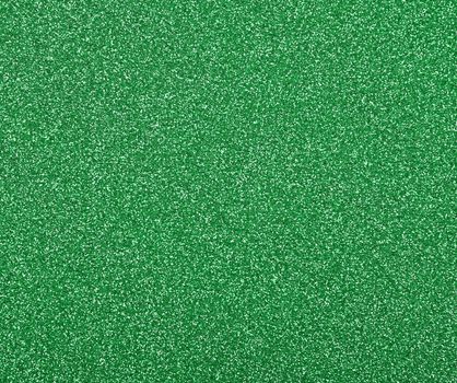 Abstract background texture of green glitter