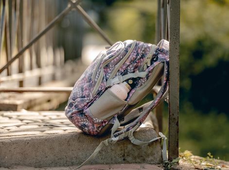 School backpack at the street