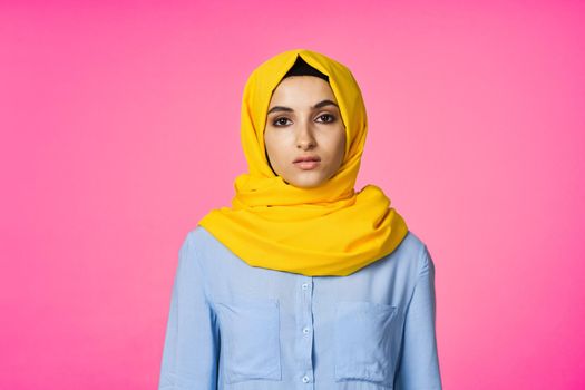 muslim woman in hijab posing fashion ethnicity pink background