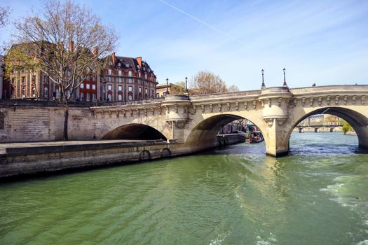 The oldest standing bridge ( Pont Neuf ) across the River Seine in Paris France. April 2019