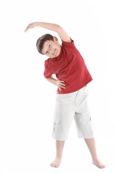 little boy performs an exercise to stretch the muscles.isolated on white